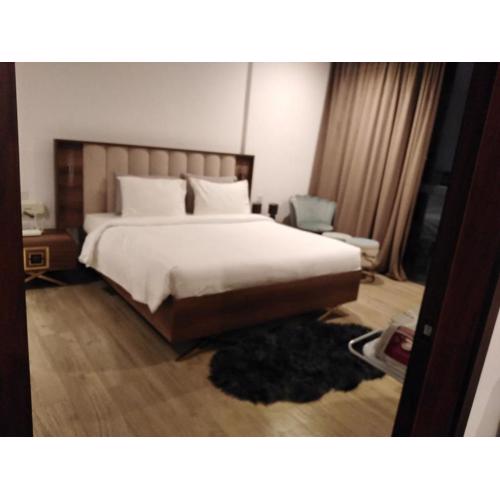 شقة غرفتين وصالة منتجع ميلينيوم صلالة لشقق التمليك - Two bedroom apartment Millennium Salalah Owning apartment