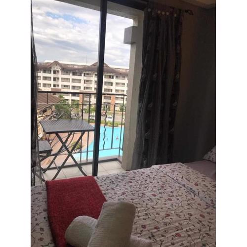 1 Bedroom unit with balcony and facing amenities and just beside SM Ecoland