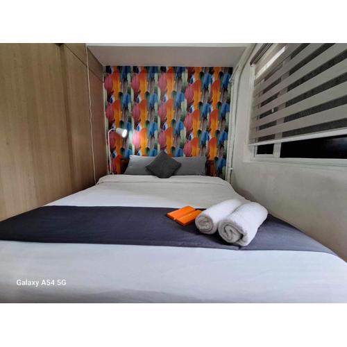 1 Bedroom with Balcony Pool View and WiFi in Grace Residences