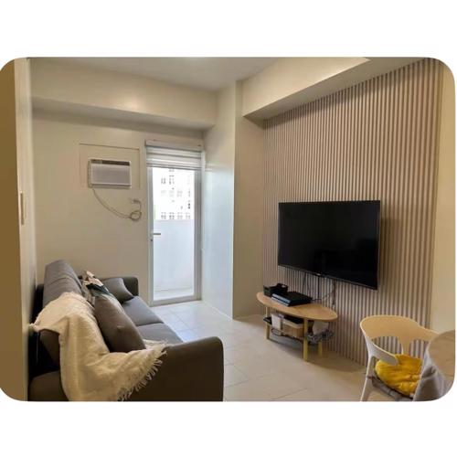 1Bedroom, living room w balcony ADHI staycation