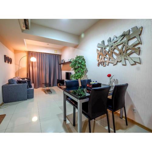 1BR Apartment at Casa Grande Residence near Kota Kasablanka By Travelio