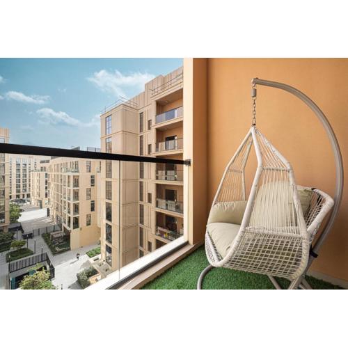 1BR Apartment With Balcony - 9 Mins to Sharjah Airport - Balcony Breeze