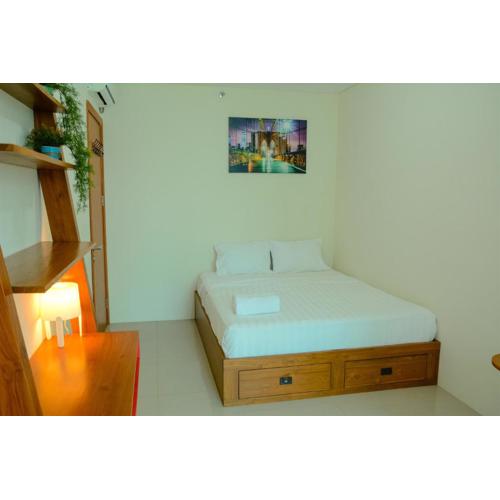 1BR Apartment Woodland Park Residence Kalibata View Swimming Pool By Travelio