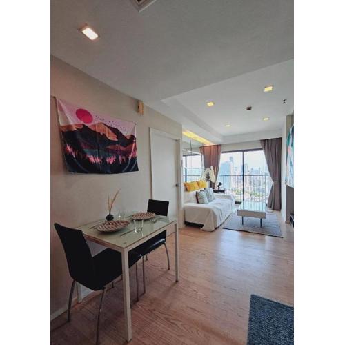 1BR at ThongLor BTS overlooking city with Workspace