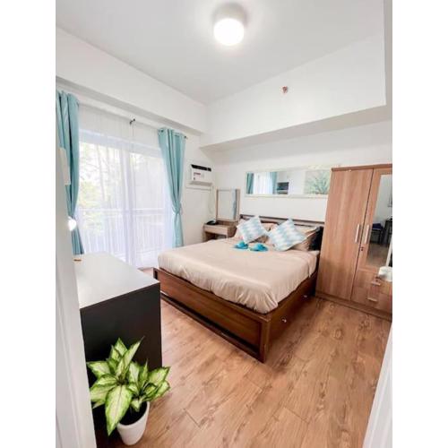 1BR By The Airport at Amani Grand Residences