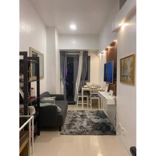 1BR CONDO Fame Residences Mandaluyong- Be My Guest Staycation- Near SM Megamall, Greenfield District, & Ortigas