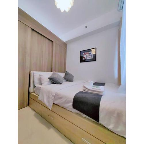 1BR Condotel with Balcony at FAME Residences #FM36