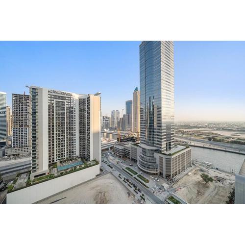 1BR Dubai, Merano Canal View Retreat Near Metro Dining Shopping Mall