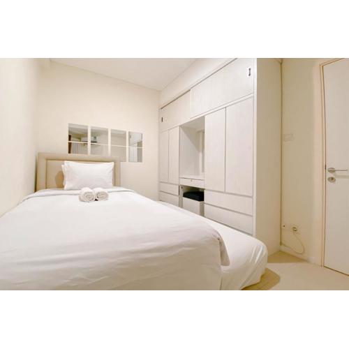 1BR with Direct Access to Pool at Parahyangan Residence Apartment By Travelio