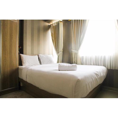 1BR with Extra Balcony The Oasis Cikarang Apartment By Travelio