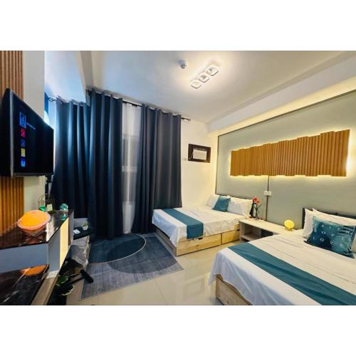 2 Bed Luxe Stay with Netflix and Pool, 10 min walk to Fuente - the Heart of Cebu City