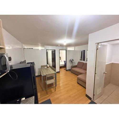 2-Bedroom Condo in Imus Cavite with UNLI WIFI, 50" TV, Netflix, Family Computer, Pool