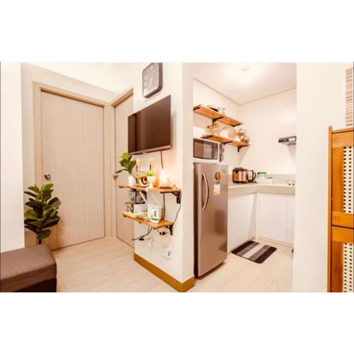 2 BR condo trees residences Netflix Games karaoke