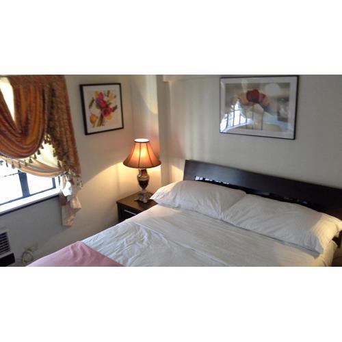 2 BR Loft Type Bright Family Friendly Apartment in Mnl