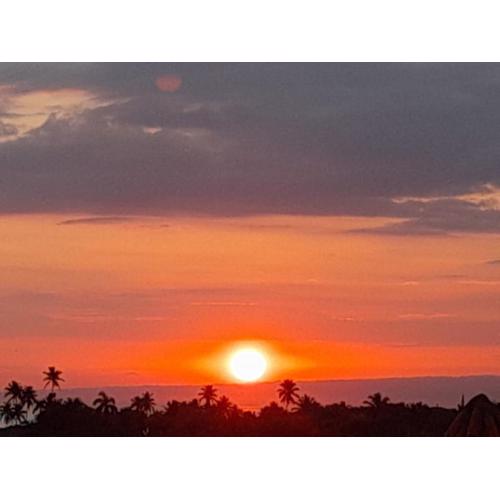 2BR & 2 WR ocean view Suite at Villa Costa Verde in Playa Cofresi, Puerto Plata, with a pool, big veranda, and a rooftop terrace