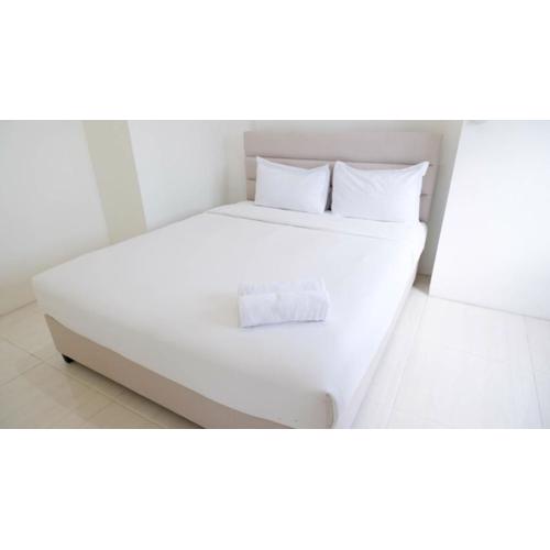 2BR Apartment at Puncak Bukit Golf Surabaya near Lenmarc Mall By Travelio