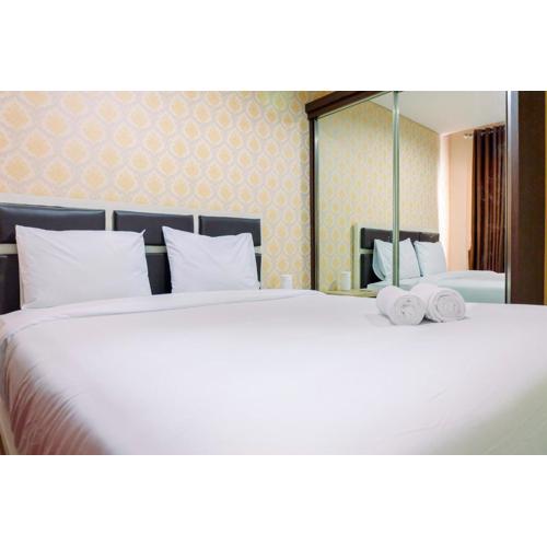 2BR Apartment with City View at Woodland Park Residence By Travelio