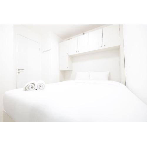 2BR Bassura City Apartment with City View By Travelio