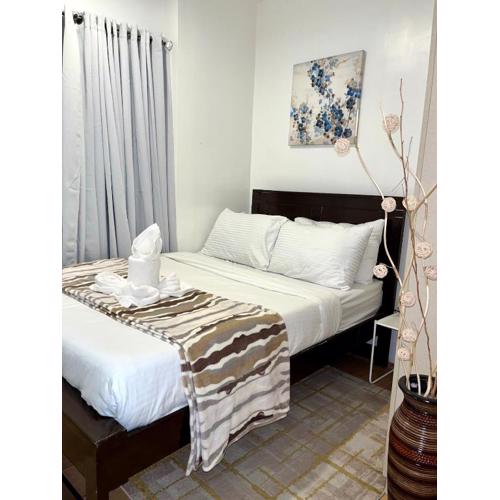 2BR Condo in Ecoland Minutes to SM City