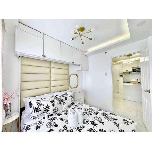 2BR Condo with Free Pool Access and Wifi