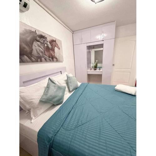 2BR Condo with Free Pool and Wifi beside SM Ecoland