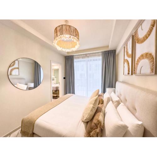 2BR Duplex with Terrace & Courtyard Views Near the Beach