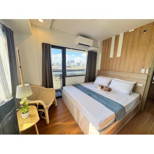 2BR facing Manila Bay & City View Shore 2 Residences MOA with Parking by Prime Stay