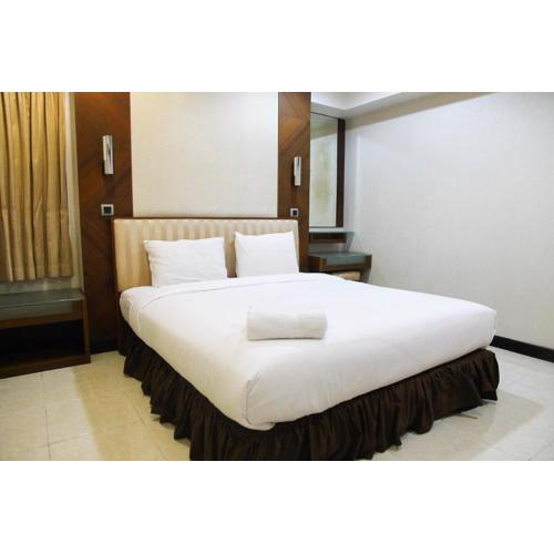 2BR Family Sudirman Tower Condominium Apartment near Plaza Semanggi By Travelio