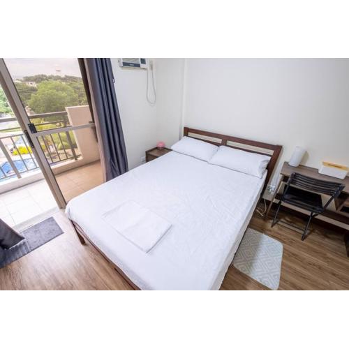 2BR Fully Air-Conditioned Staycation PLUS Free Parking