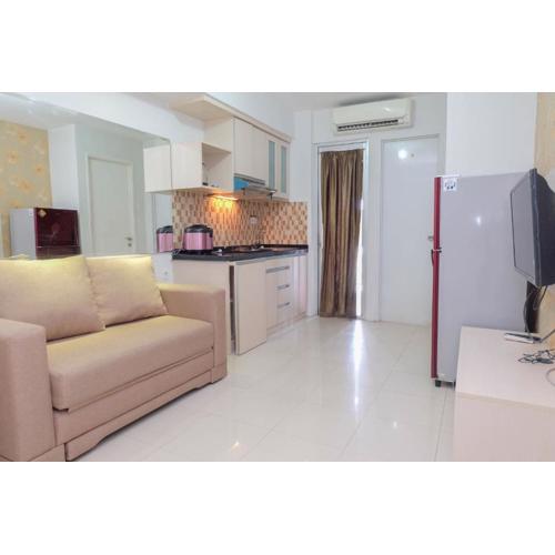 2BR with Cozy Style at Bassura City Apartment By Travelio