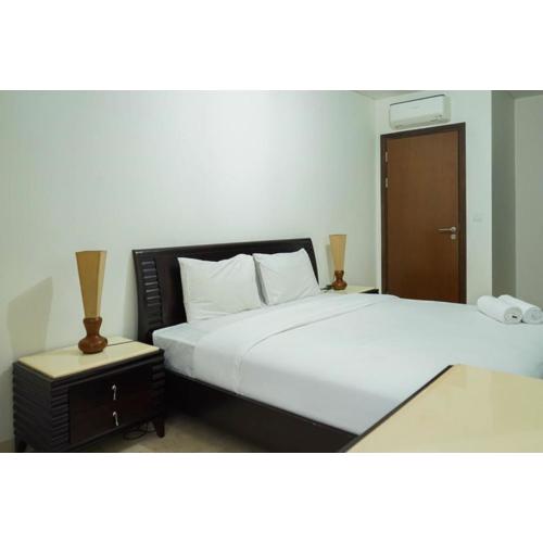 2BR with Study Room at L'Avenue Apartment By Travelio