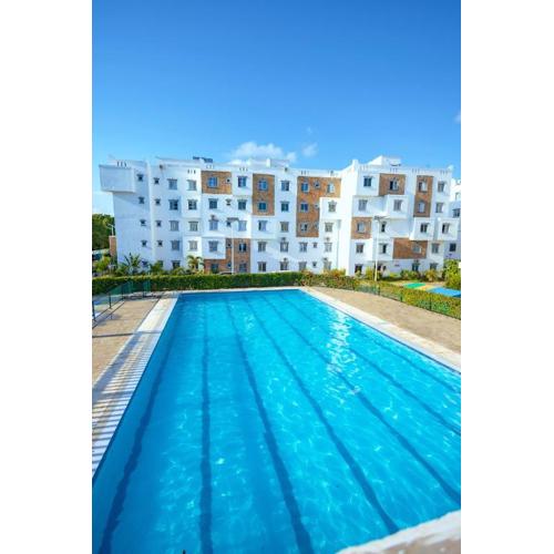 3 BR Group Stay Mombasa - AC-Pool-Gym-Playground- Haven & Harmony Hosts