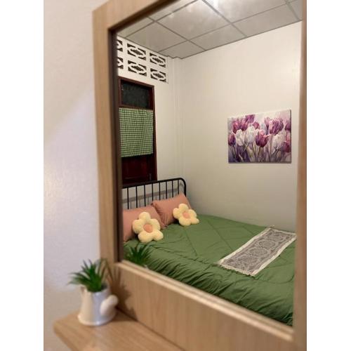 บ้านสวนชายน้ำ โฮมสเตย์ อัมพวา