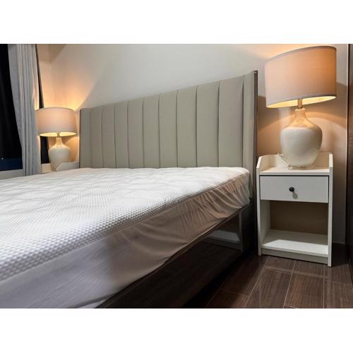 A King-size bed at Air Residences Condo, Ayala Ave, Makati