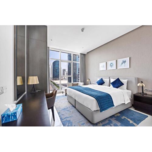 A Living Modern 1BR Apartment with Balcony & Canal View at Prive-517 Business Bay