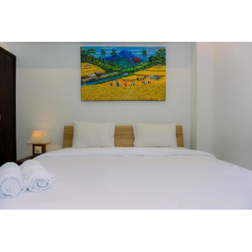 A Luxury 1BR Bali Style Apartment at Branz BSD City By Travelio