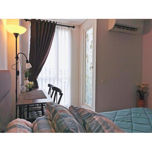 A Peaceful Room at Barsacity Apartment by Ciputra