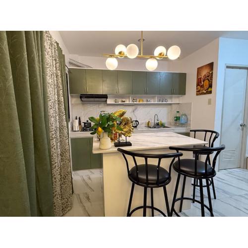 A Suburban Haven, top floor unit with Balcony- at Camarin Caloocan City!!