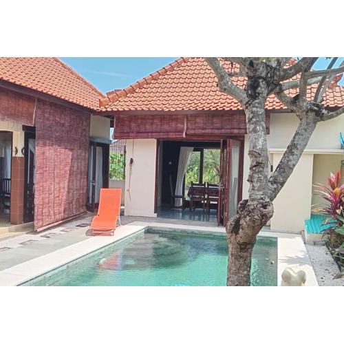 A villa with a pool located in a quiet area on the outskirts of Bali