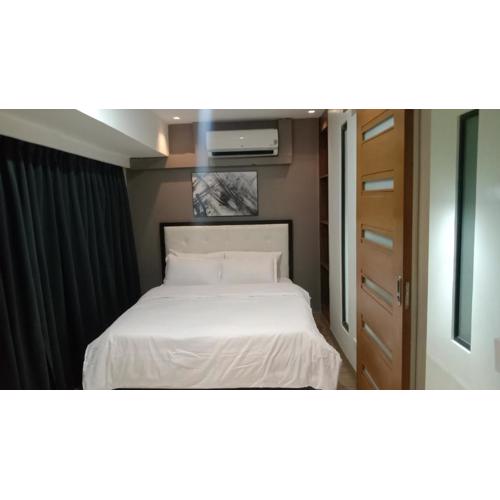 A2J Luxury BGC 2BR Loft Near Malls, Burgos Circle