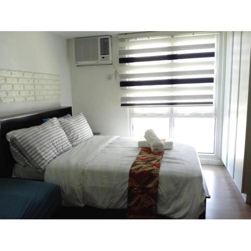 Abreeza Studio Suite T1-1917 - AC, Wifi, Kitchen, Pool, Washer