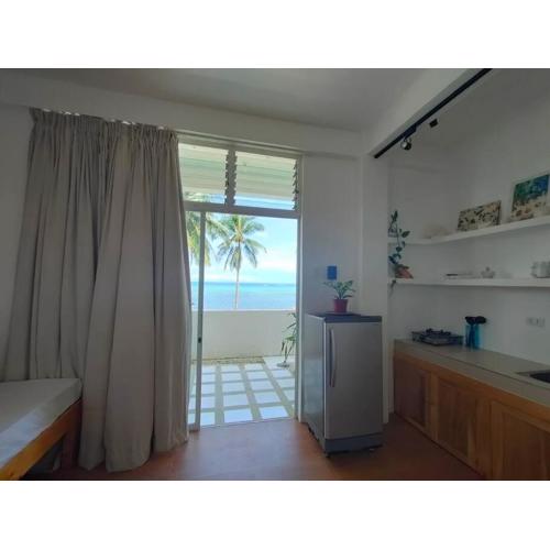 Absolute Beachfront Studio with Kitchen & Balcony