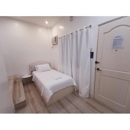 Acrige Apartelle Studio Rooms at heart of Bogo City
