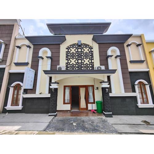 Adiputra Guesthouse HomiQ