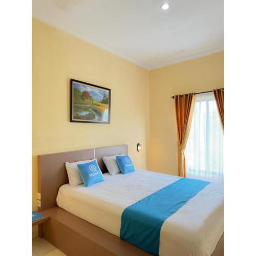 Adiputra Guesthouse Tata Bumi by HomiQ