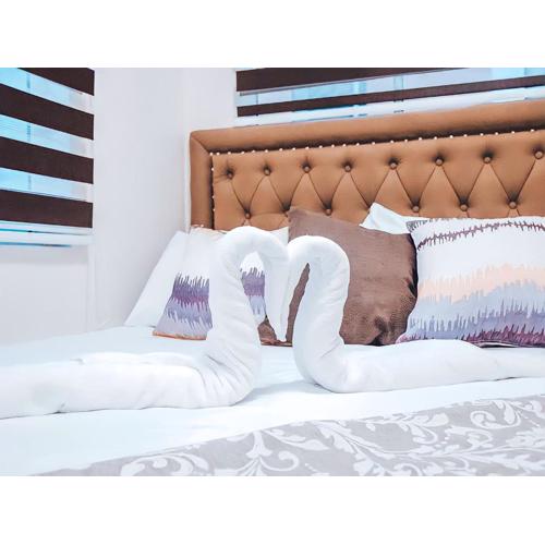 Affordable 2 Bed Condo Rental in Davao City with Wifi & Netflix, Swimming Pool, Gym & Billiard Hall