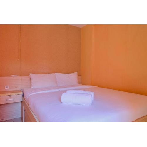 Affordable Price 2BR Green Pramuka City Apartment By Travelio