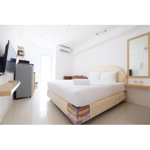 Affordable Studio with Sofa Bed at Bassura City Apartment By Travelio