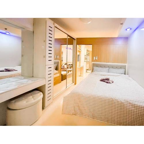 Air Condo Urban Retreat 1BR w City View MOA