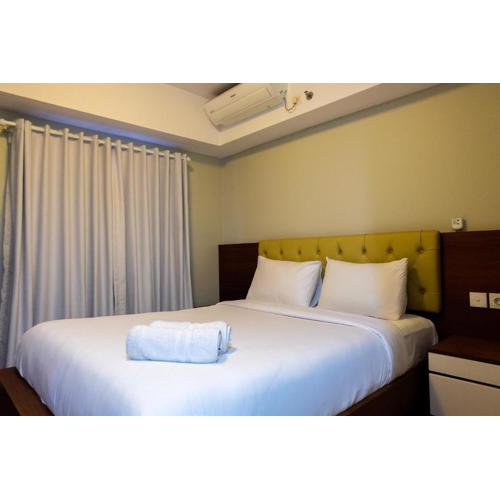 Amazing 2BR with City View The Wave Kuningan Apartment By Travelio